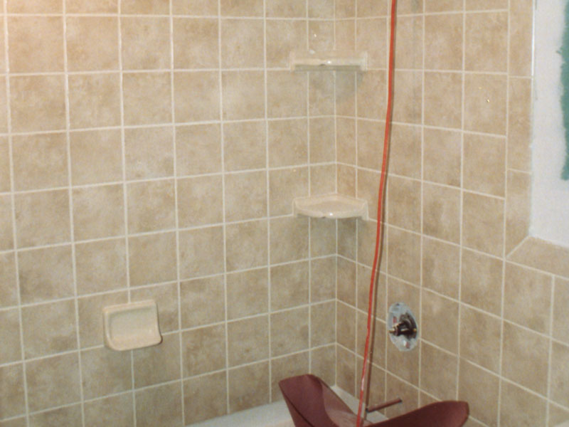 Ceramic Tile above the tub in a bathroom renovation
