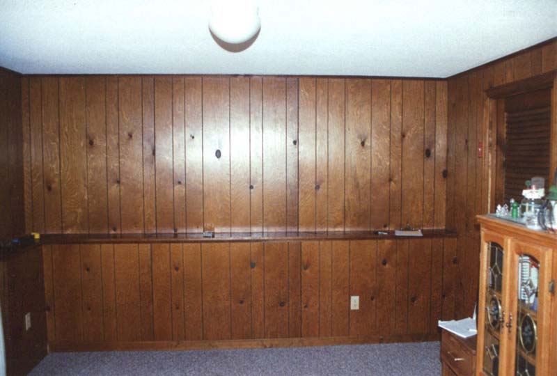 Blank wall all set to be a space for a built-in unit contining cabinets and shelves.